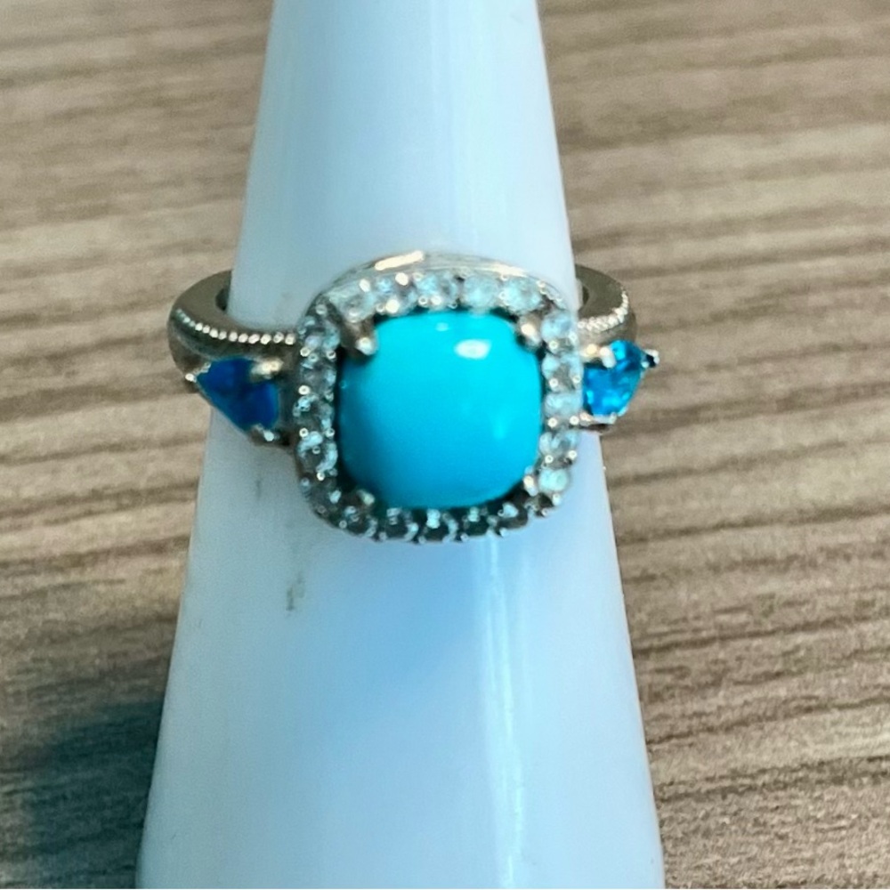 Sterling Silver Turquoise Halo Ring with Blue Accent Stones